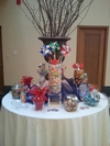 Use of wedding themed center piece adds dimension